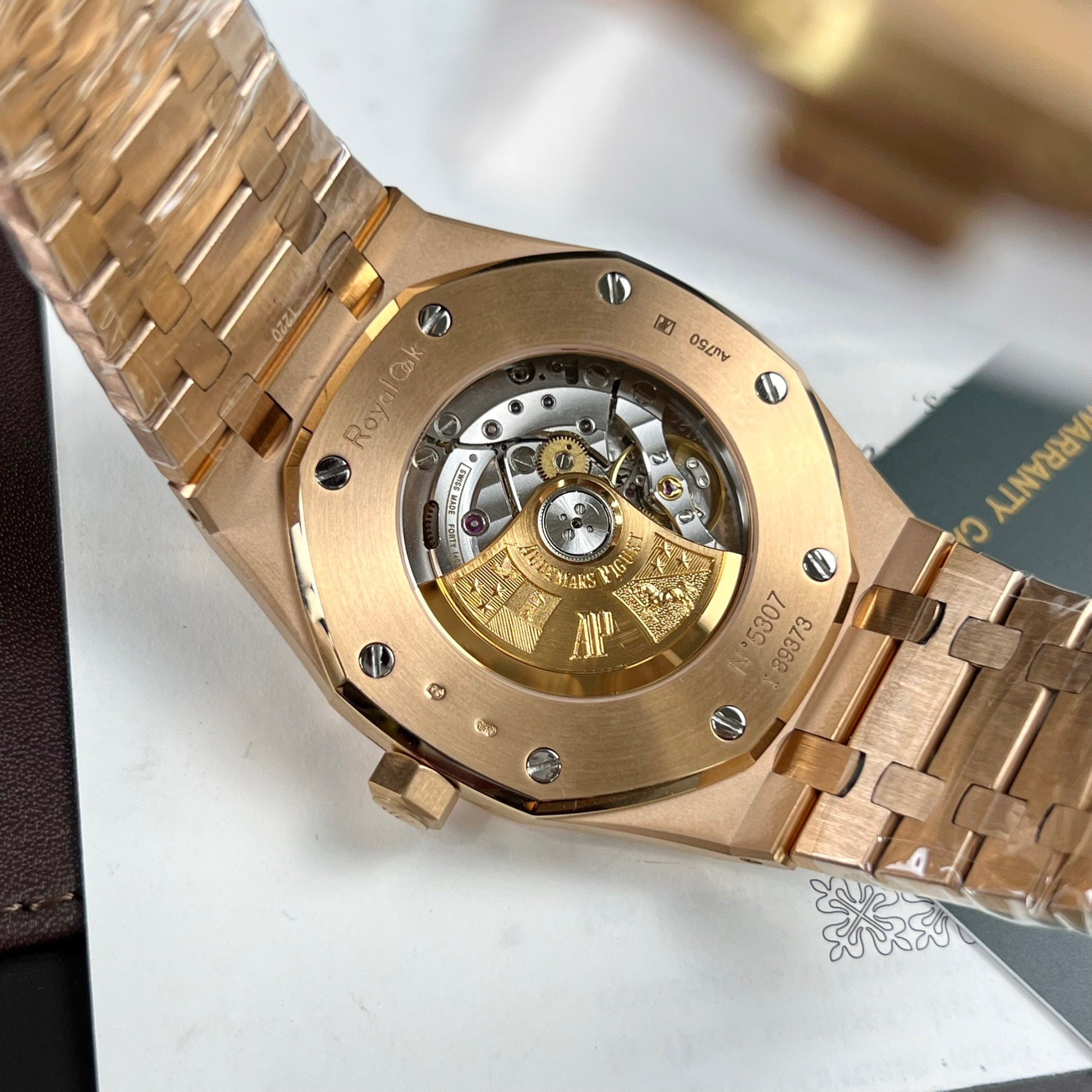 Audemars Piguet Royal Oak 15400OR custom Moissanite baguette and 18k rose gold EU Watch Store