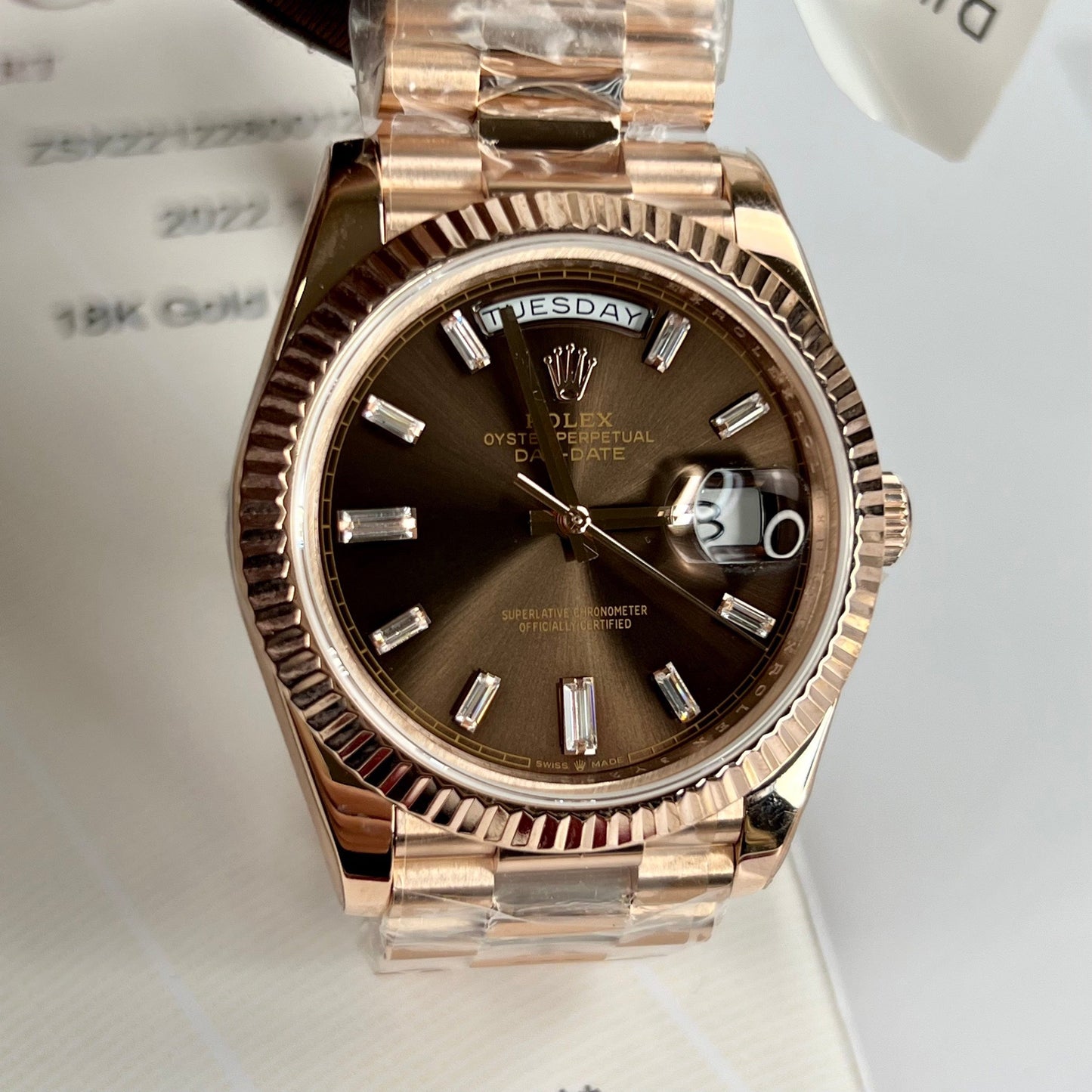 Rolex Day-Date 40 mm 228235 cadran chocolat or rose 18 carats rempli 150 grammes