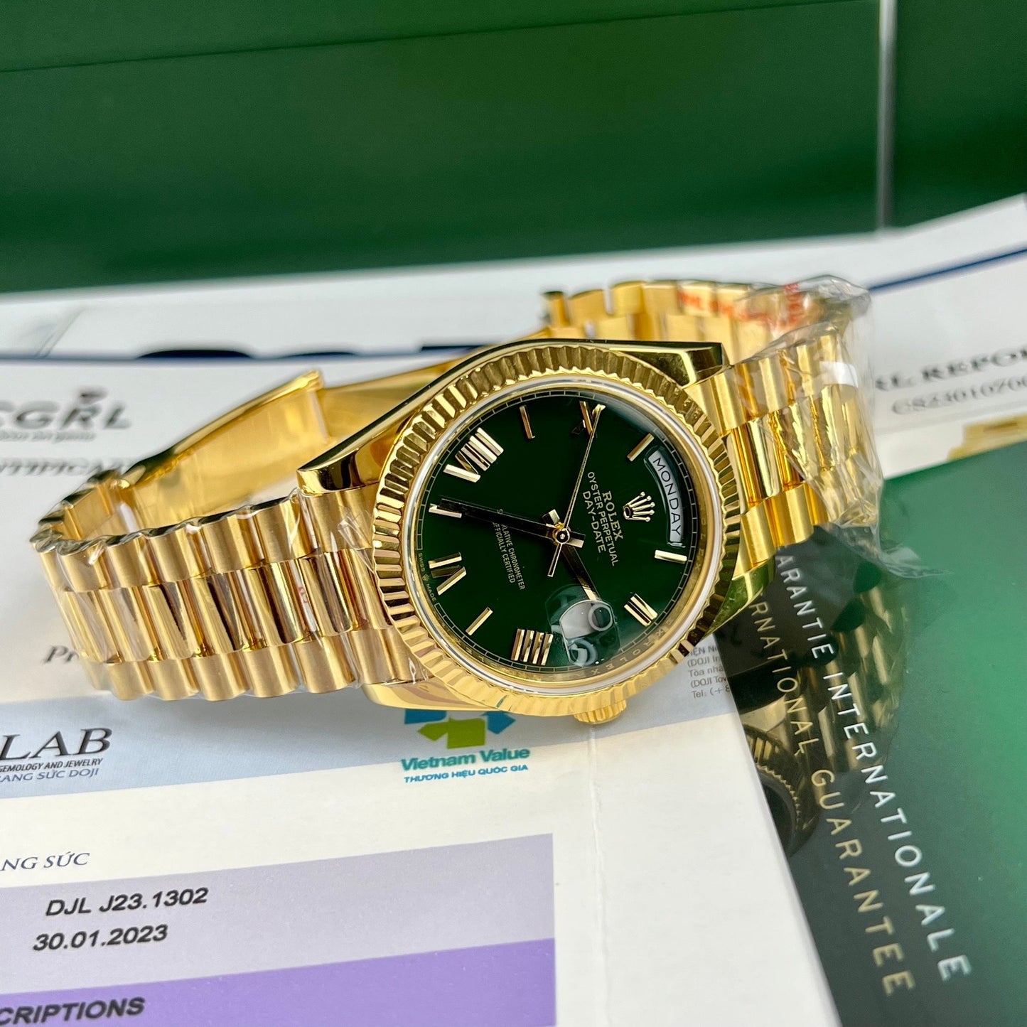 Rolex DayDate 40 mm 228238 beschichtetes 18-karätiges Gelbgold, Präsident, grünes Zifferblatt, 130 Gramm