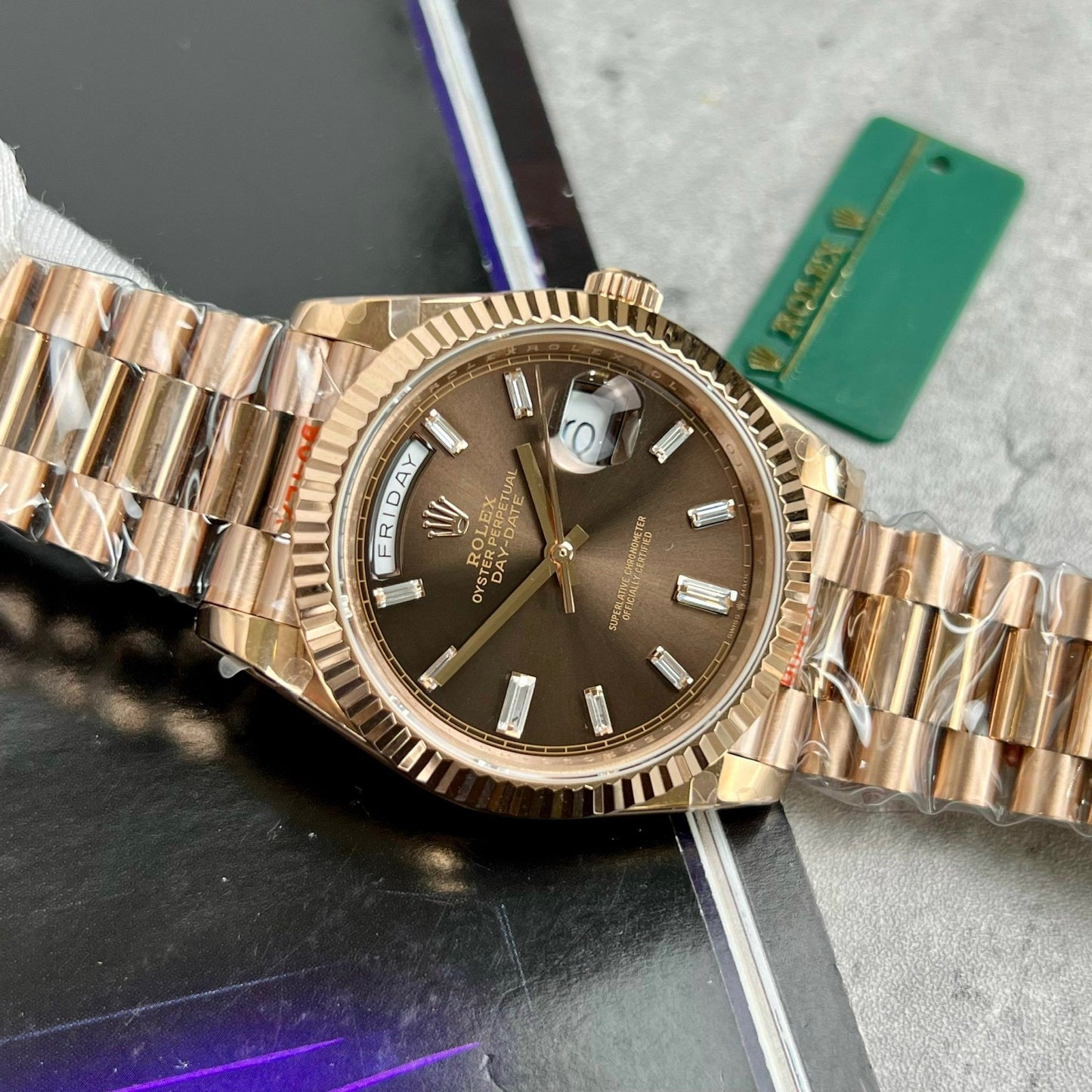 Rolex Day-Date 40 mm 228235 cadran chocolat or rose 18 carats rempli 167 grammes