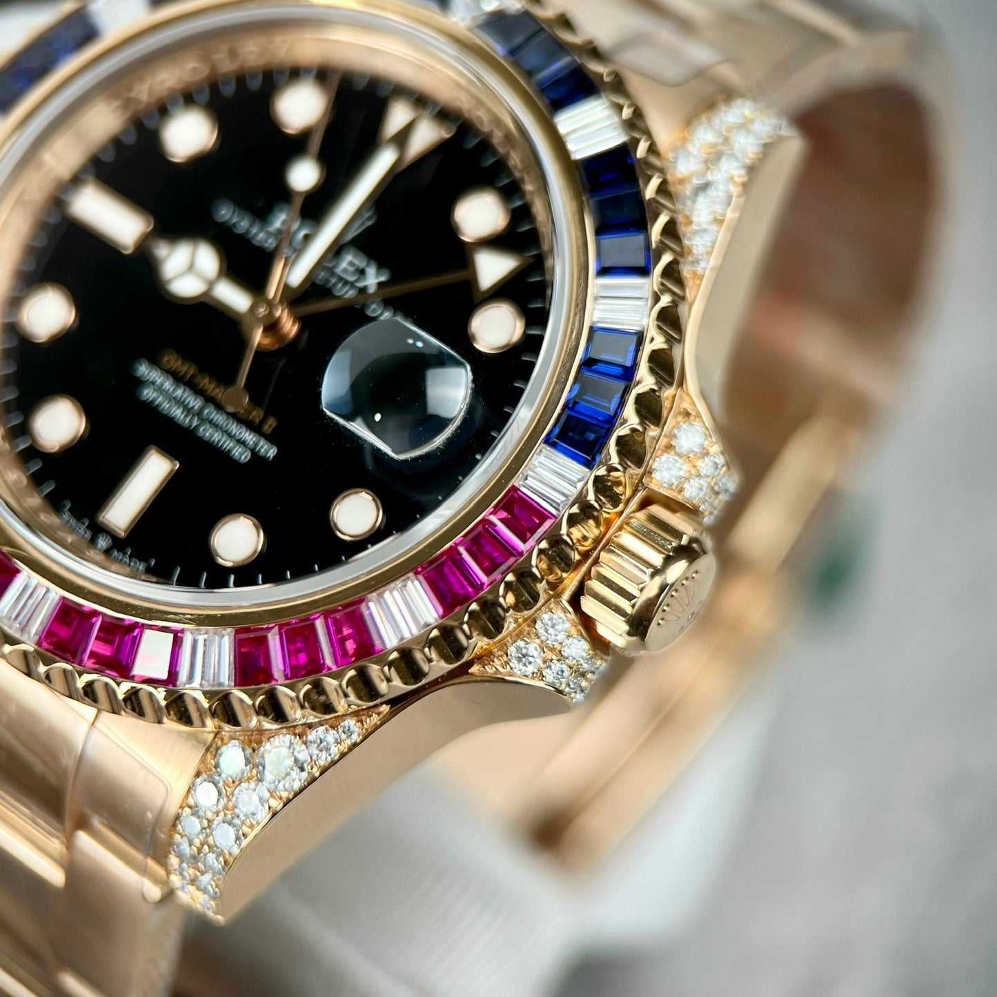 Rolex GMT-Master II 126755 Rainbow Bezel Best 1:1 Edition with Ruby Stone and 18k wrapped